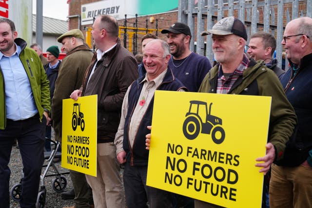 Farmers protest outside the Northern Farming Conference in Hexham in Northumberland against the government’s proposals to reform inheritance tax (IHT) rules (Owen Humphreys/PA)