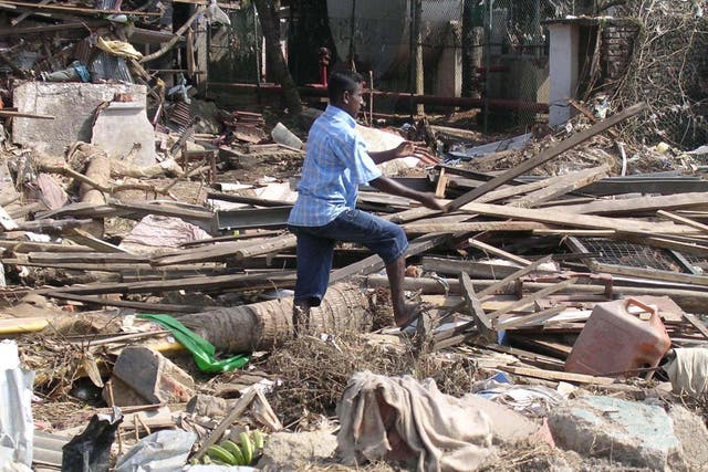 The clearing-up process in Galle, southern Sri Lanka (Caroline Gammell/PA)