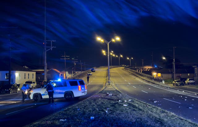 <p>New Orleans Police block the Almonaster Avenue Bridge after a deadly shooting during a second line celebration</p>