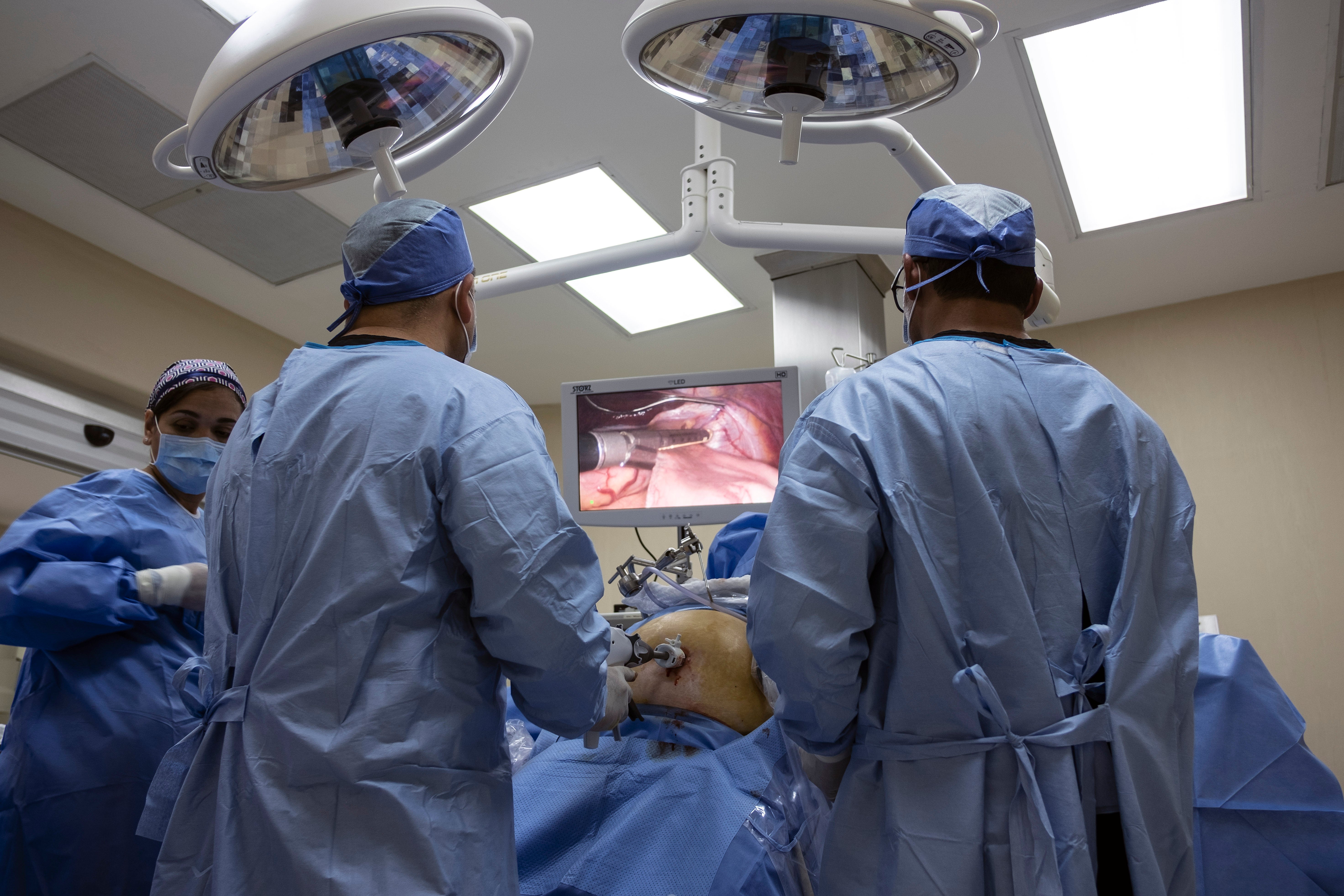 Doctors carry out a bariatric surgery at Hospital Oasis of Hope in Tijuana