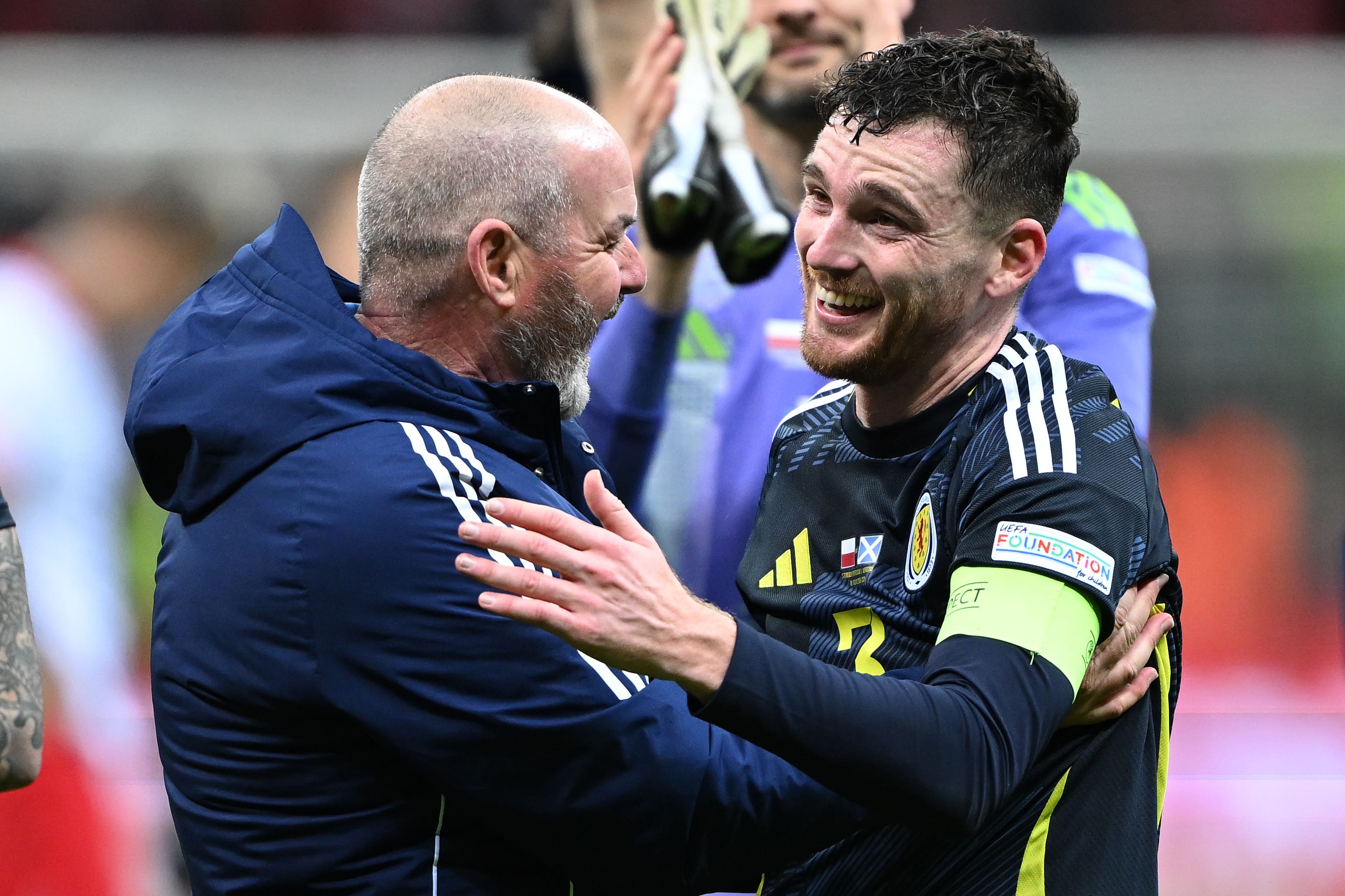 Andy Robertson celebrated his late winner with Steve Clarke