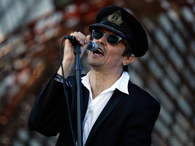 <p>Spider Stacy of The Pogues performing in 2009</p>