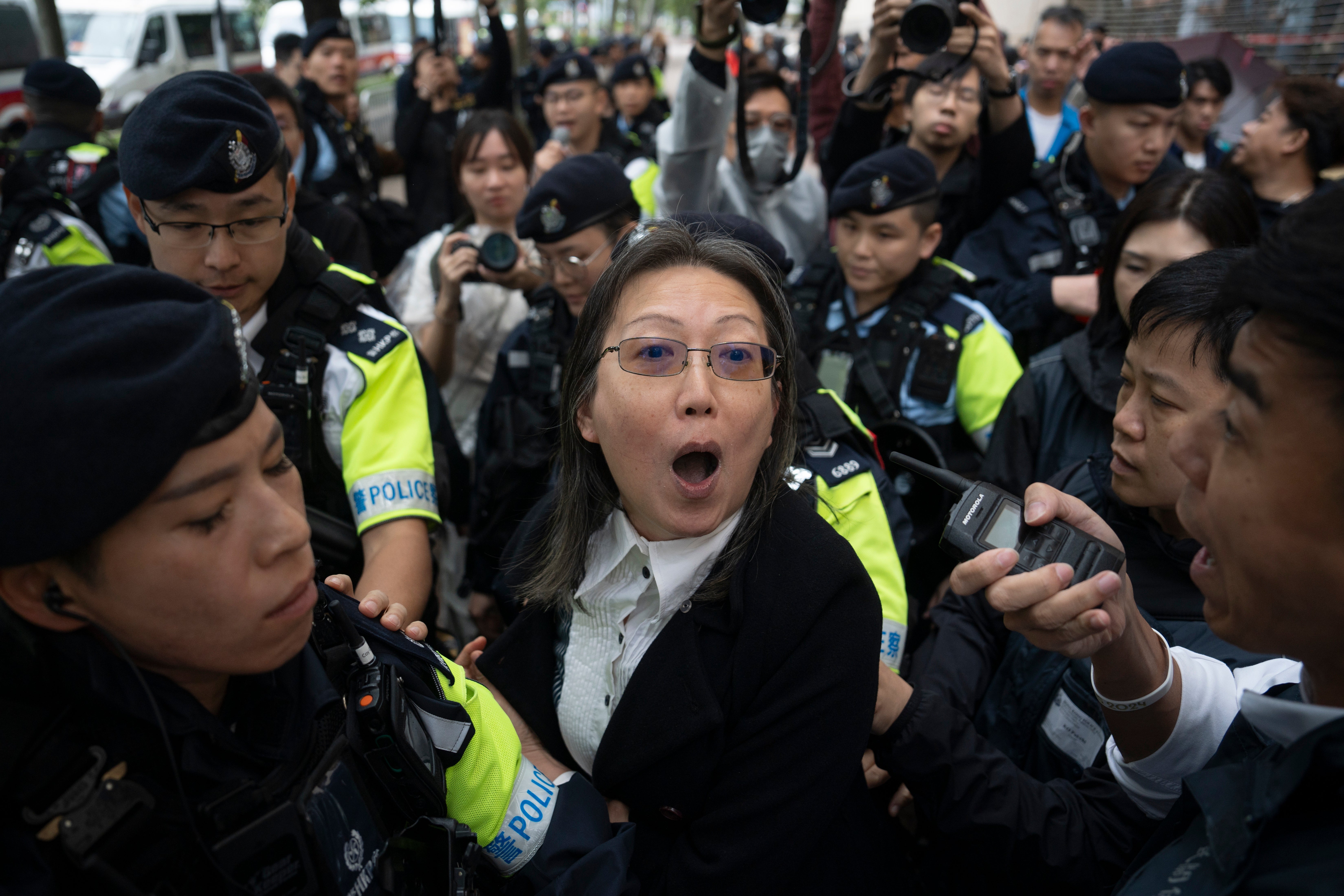 A pistillate   is stopped by constabulary  extracurricular  the West Kowloon Magistrates Court successful  Hong Kong connected  19 November 2024