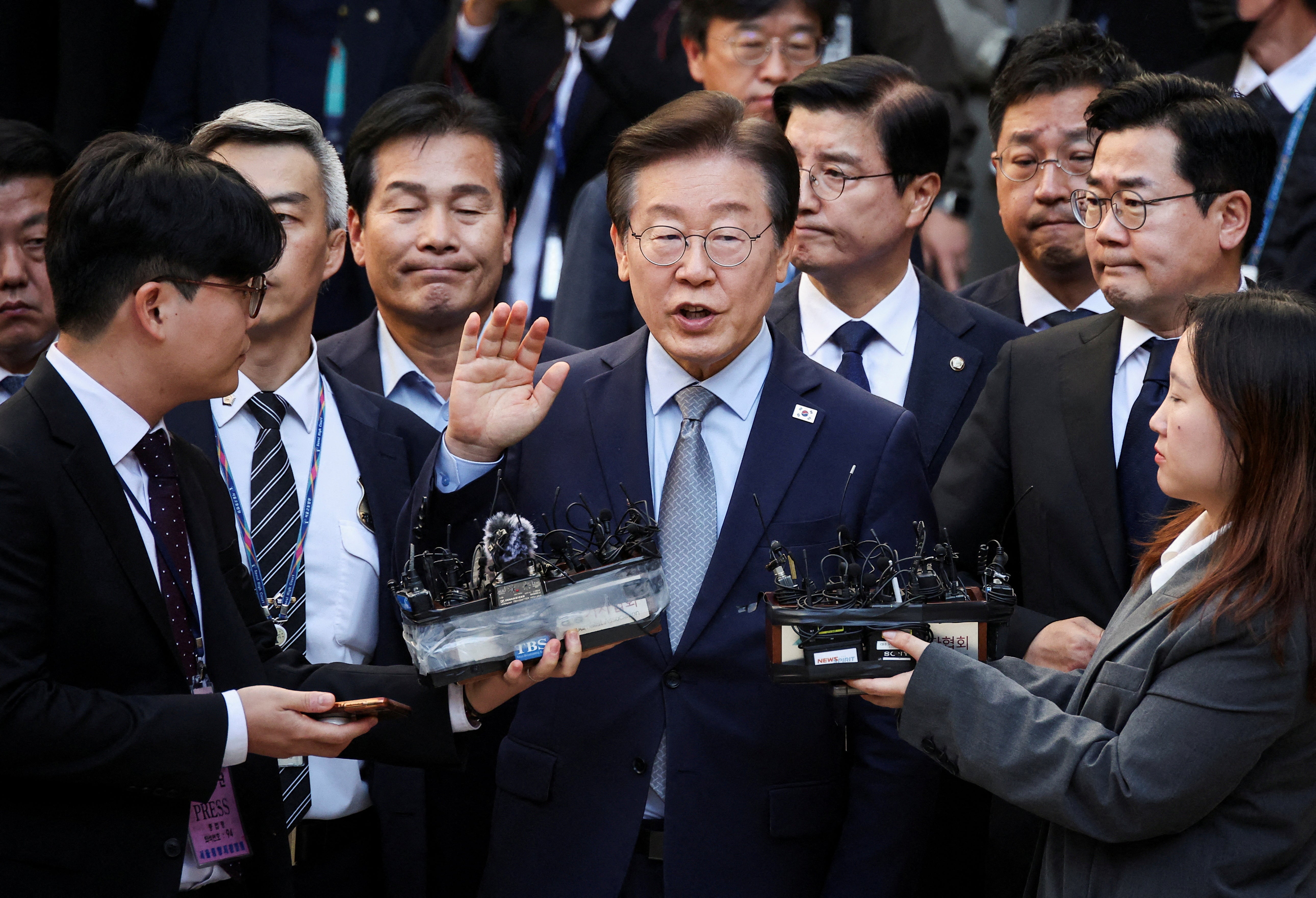 File: South Korea’s main opposition Democratic Party Leader Lee Jae-myung leaves a court after his hearing, in Seoul