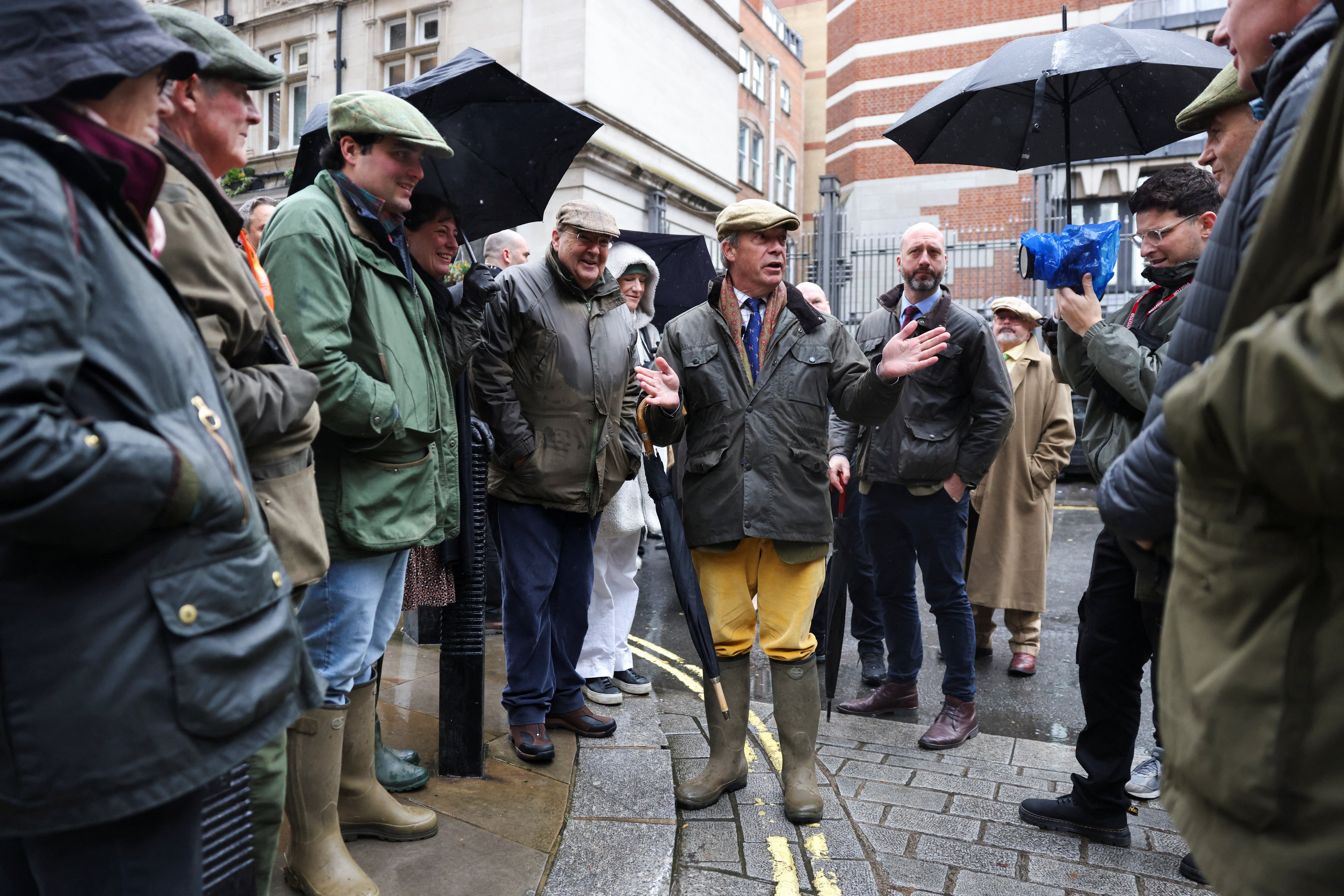 Nigel Farage speaks to farmers who have gathered for the farmer protest