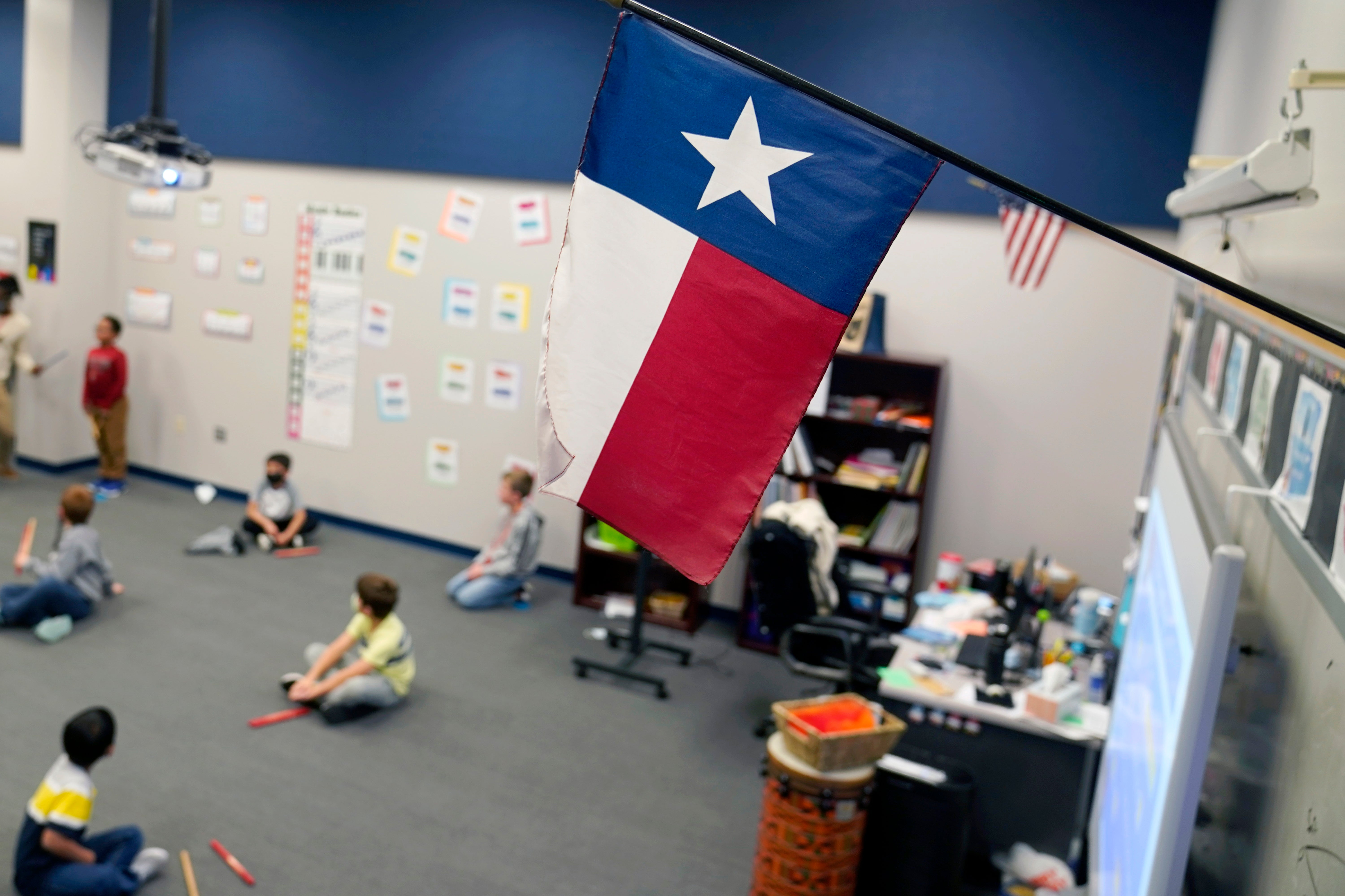 A Texas flag is displayed in an elementary school in Murphy, Texas, Thursday