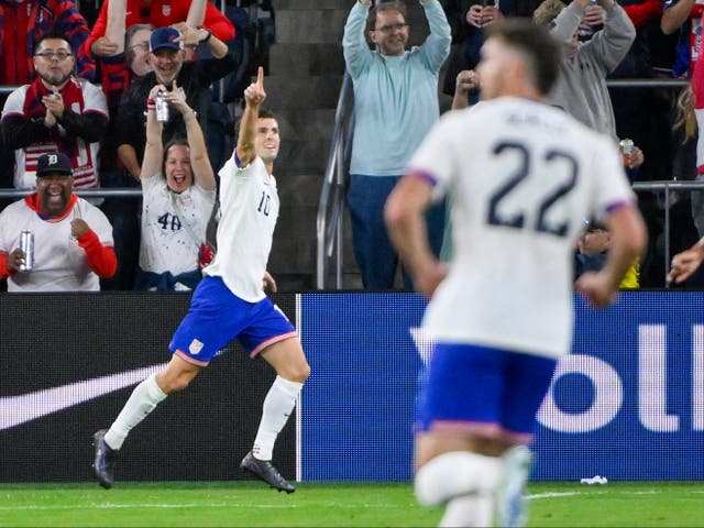 <p>Christian Pulisic scores against Jamaica during the first half at CITYPark in St Louis, Missouri, on Monday November 18</p>