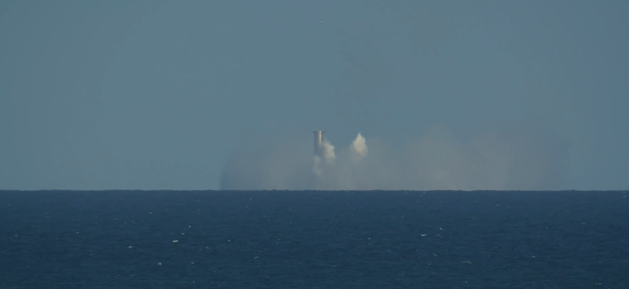 The Starship Super Heavy booster splashes down in the Gulf of Mexico after SpaceX aborted a catch attempt at the launch tower in Texas