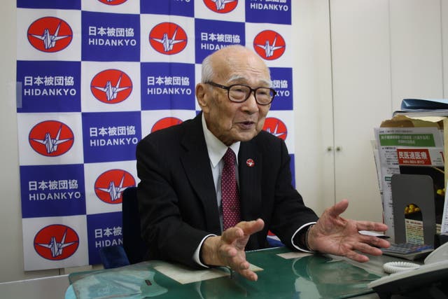 <p>Terumi Tanaka, co-chair of Nihon Hidankyo, speaks to The Independent in the group’s office in Tokyo</p>