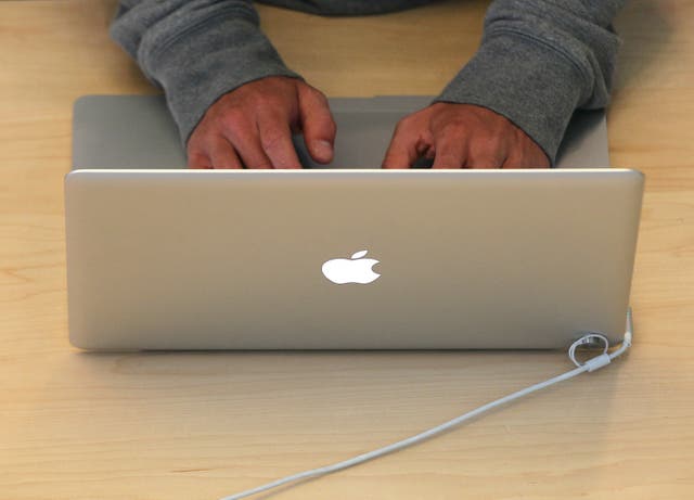 <p>Customer uses MacBook at store </p>