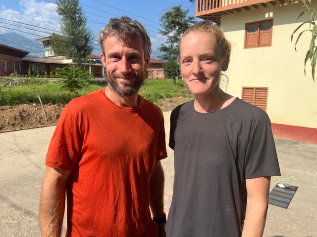 <p>Long way home: Ry Webb and Laura Murphy at Tumlingtar airport in Nepal</p>