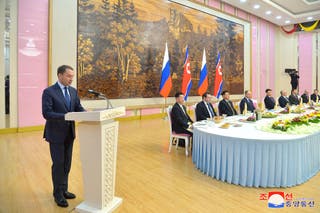 Alexander Kozlov speaks at a banquet for the Russian delegation at a hotel in Pyongyang