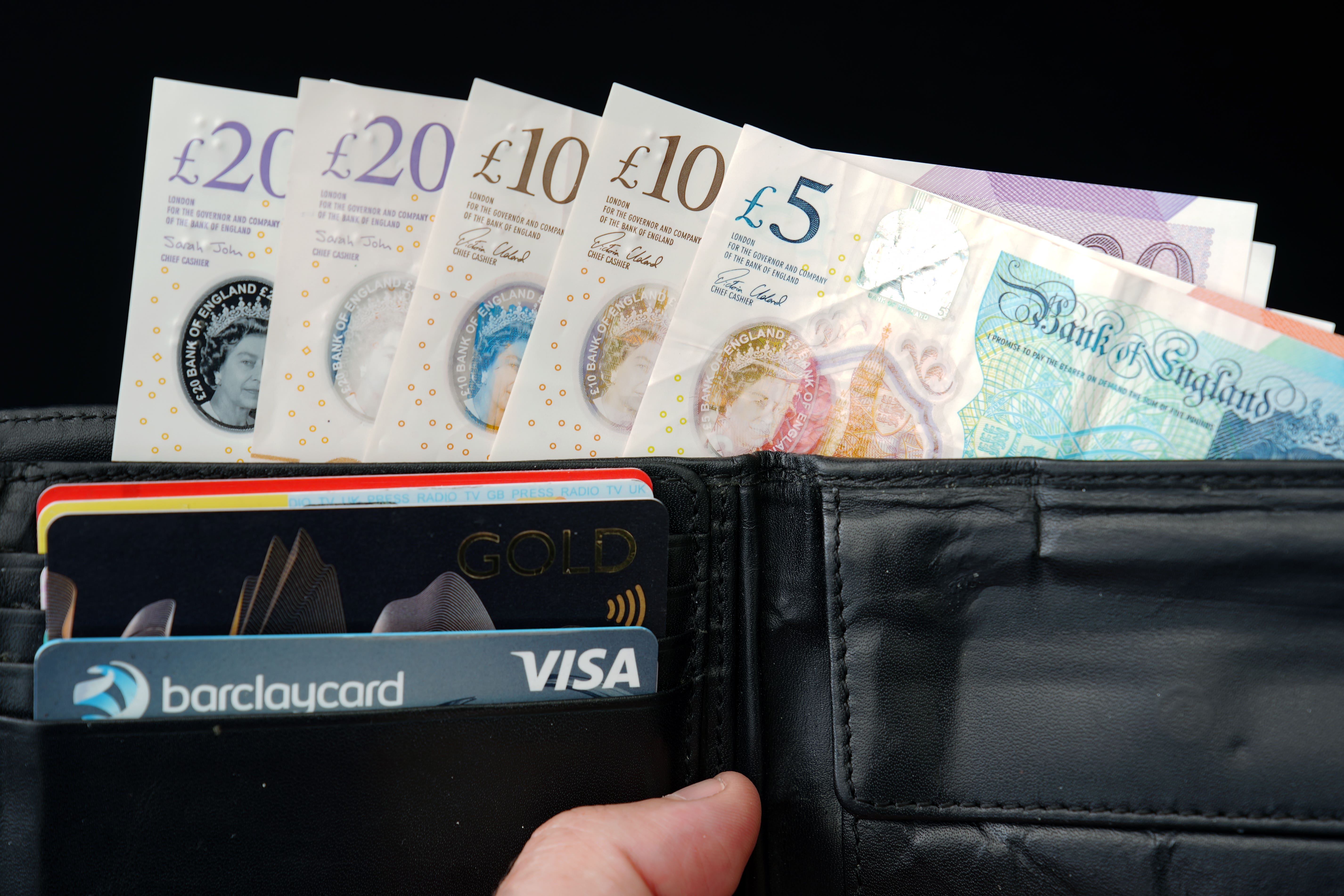 Only 8% of people still use physical cash ‘all of the time,’ a survey for NatWest suggests (Peter Byrne/PA)