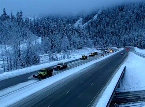 More than a foot of snow fell around Snoqualmie Pass. Members of the state’s transportation department were using plows to help keep roads clear as snow continued to fall on Wednesday