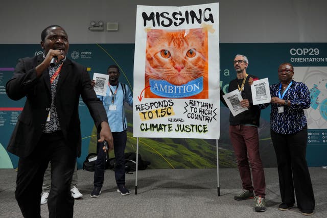 <p>Activists participate in a demonstration for climate justice at the Cop29 </p>