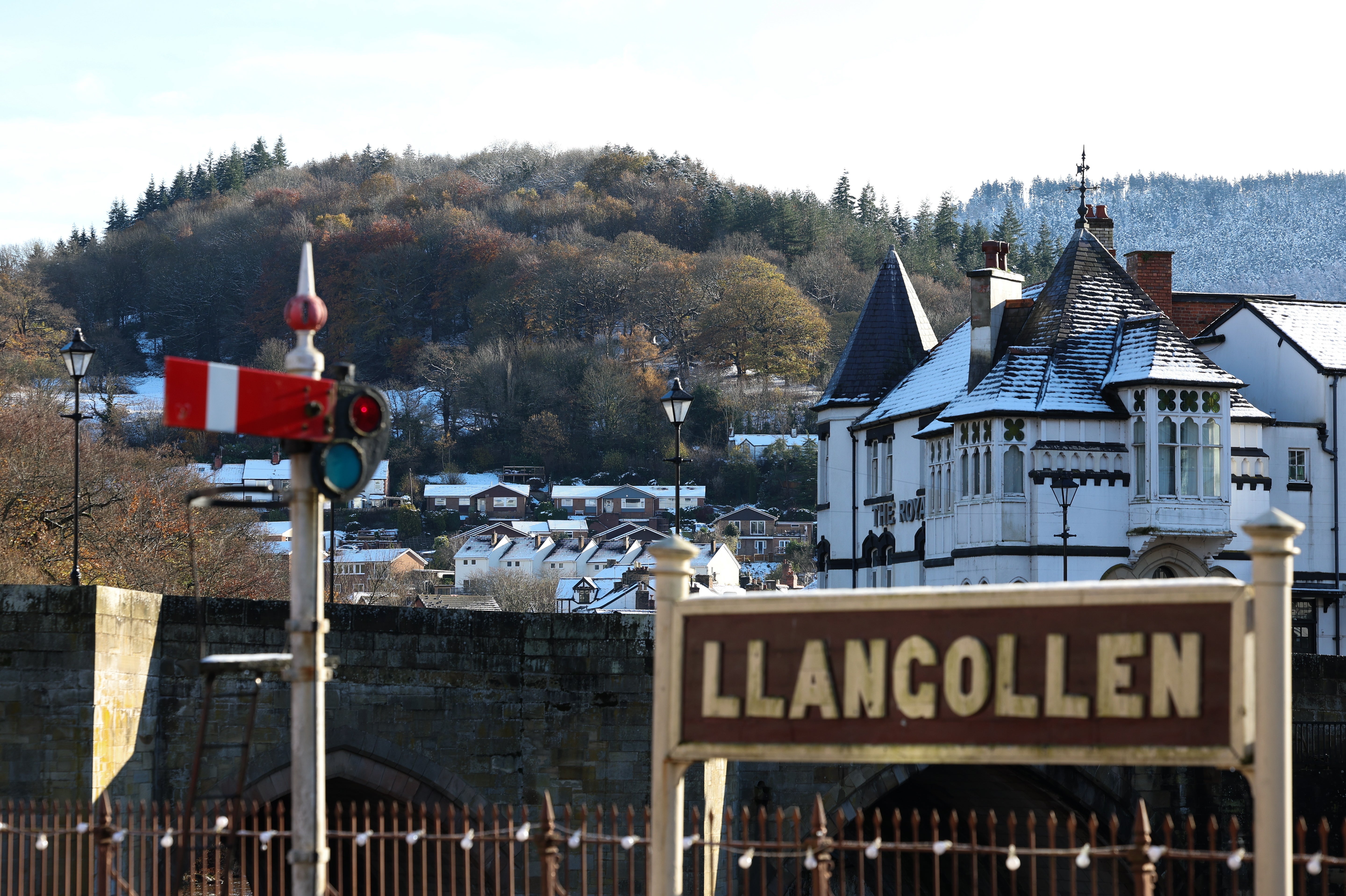 Snow covers houses and hills in Llangollen in Wales