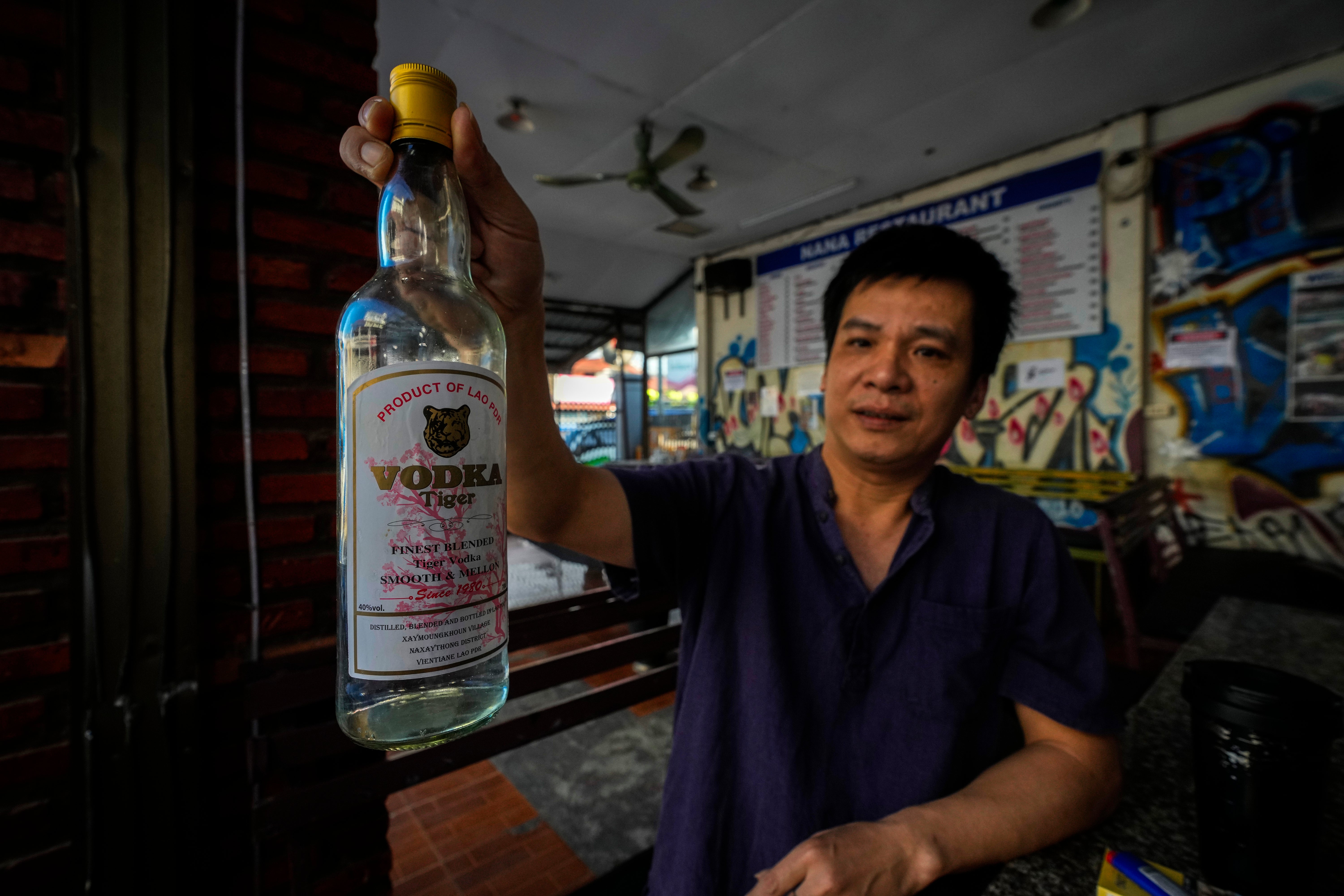 Duong Duc Toan, the manager of Nana Backpack hostel, says alcohol served from the hostel’s bar is from a certified distributor