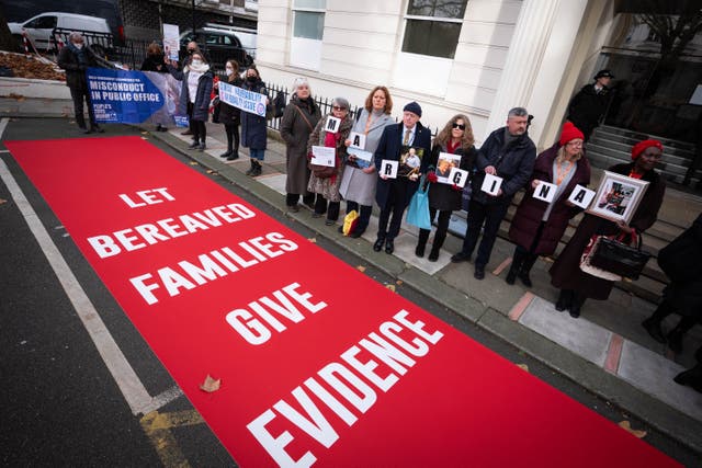 Bereaved families demonstrate outside Dorland House (James Manning/PA)