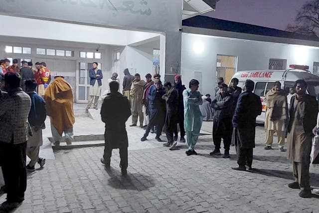 <p>Local residents and volunteers gather and wait for the arrival of victims of gunmen firing incident on passenger vehicles, at a hospital in Parachinar, in Kurram district of Pakistan’s northwestern Khyber Pakhtunkhwa province, Thursday, 21 November 2024</p>