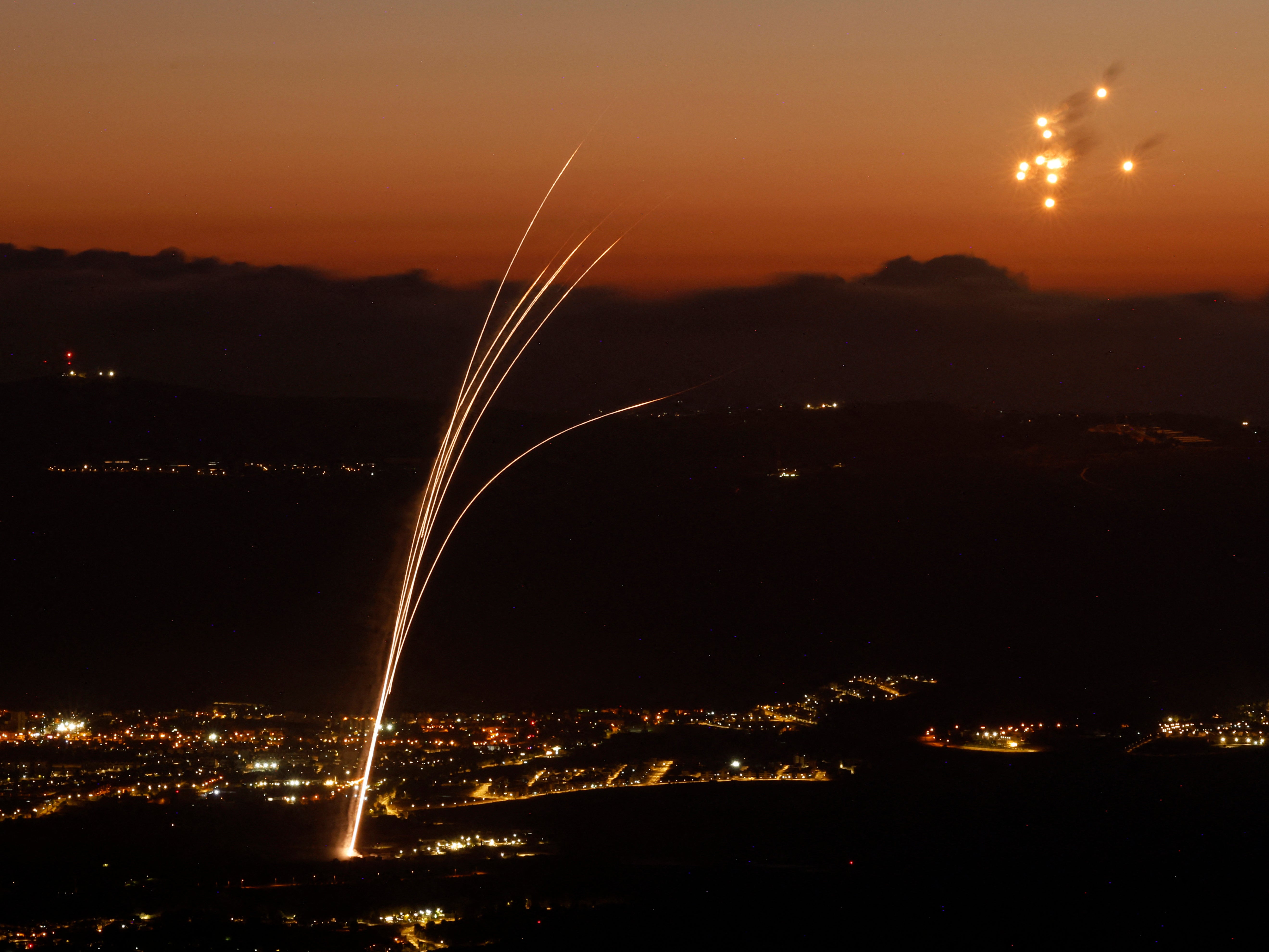 Rockets fired from southern Lebanon are intercepted by Israel’s Iron Dome air defence system