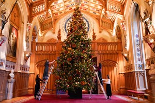 Kate Middleton’s carol service message revealed with William and kids set to attend - Royal family news 1 Royal Collection Trust staff add the finishing touches to a Christmas tree in St George’s Hall, Windsor Castle (Andrew Matthews/PA)