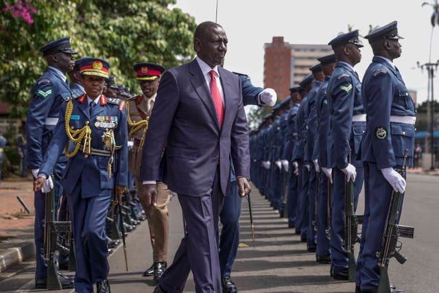 <p>Kenyan president William Ruto reviews the honour guard after arriving to give the State of The Nation address at Parliament buildings in Nairobi, Kenya on 21 November 2024 </p>