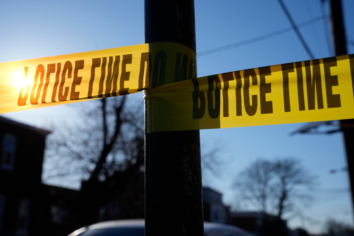 Naked man arrested on high school football field after teen killed in a nearby home