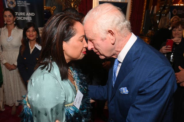 The King and Mere Takoko perform hhe hongi, a traditional Maori greeting, as Charles joined scientists, businesses and indigenous leaders to celebrate the launch of the Circular Bioeconomy Alliance at St James’s Palace in London (Eamonn McCormack/PA)