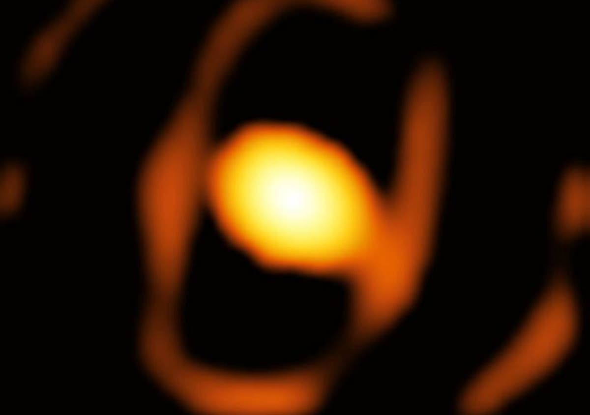 Scientists take first ever close-up picture of star outside our galaxy – and see strange structure around it