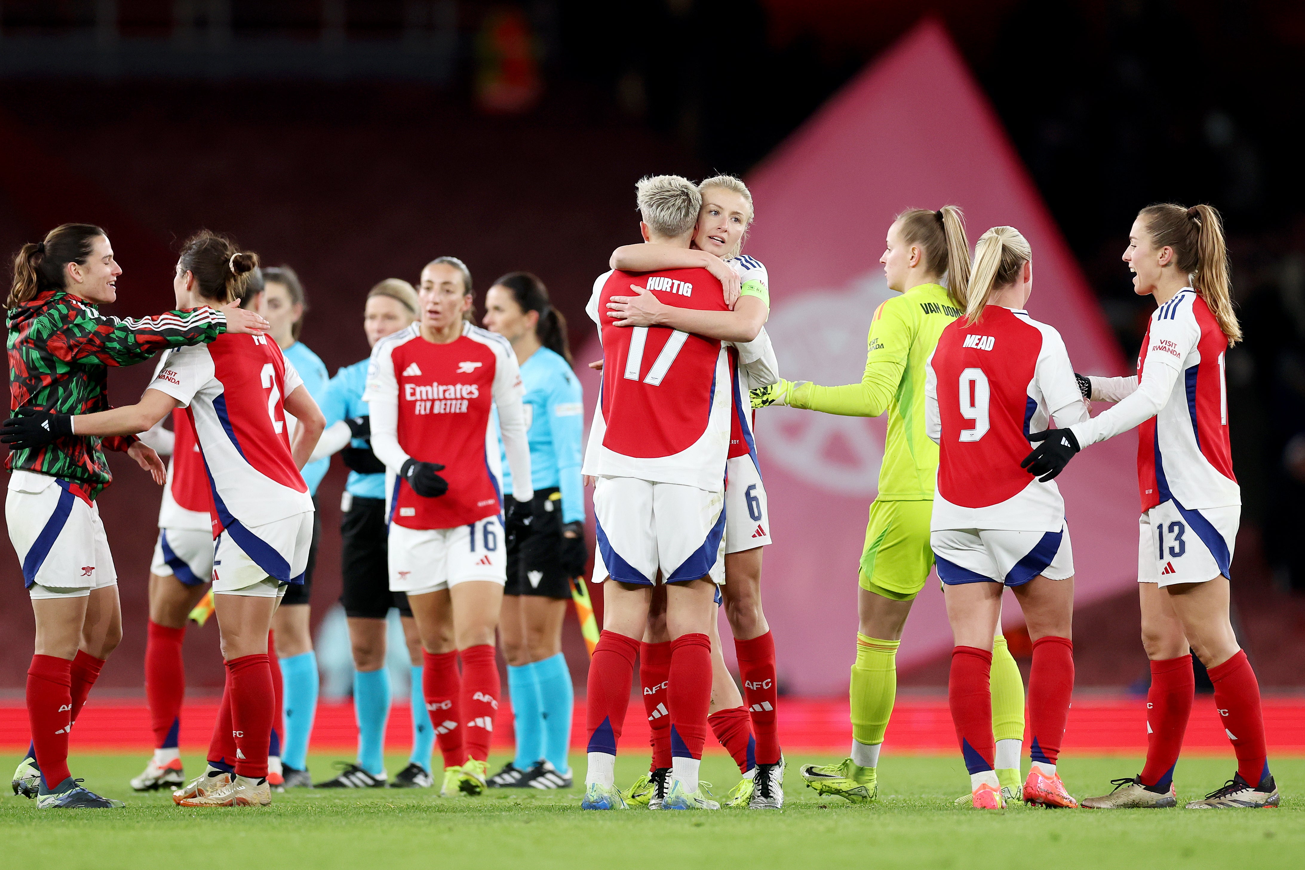 Leah Williamson of Arsenal embraces teammate Lina Hurtig