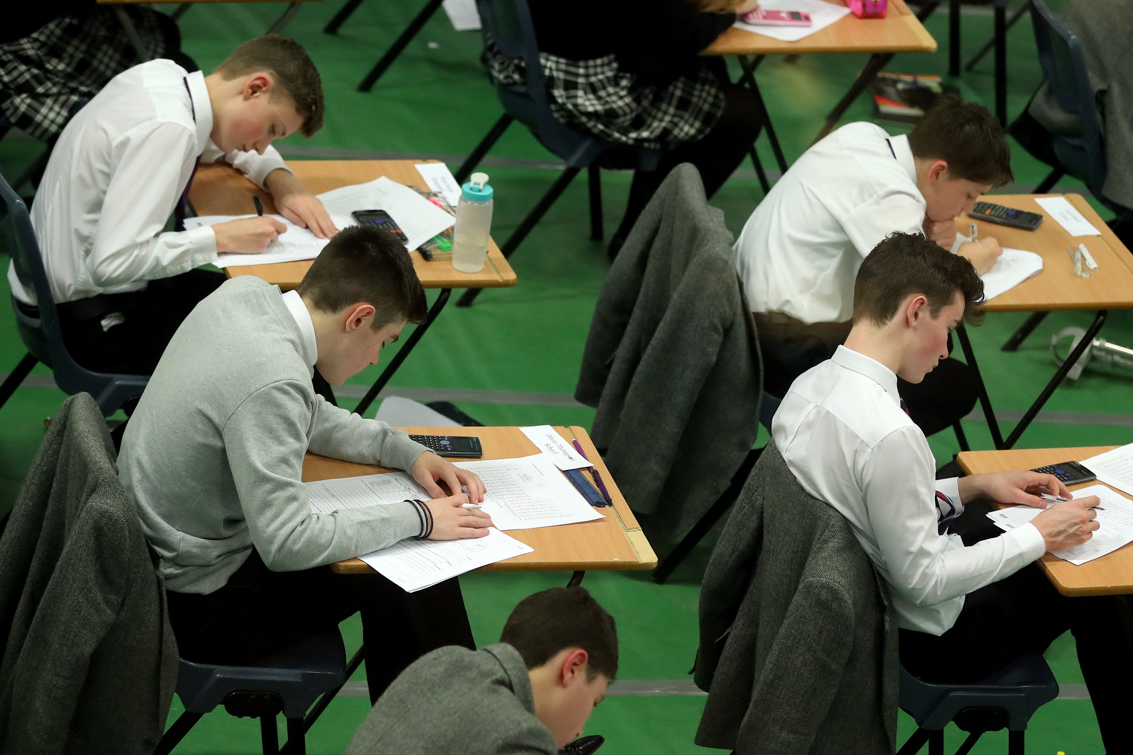 AQA has asked the Government to explore reducing some subject content and the number of exam papers on a subject-by-subject basis (Gareth Fuller/PA)