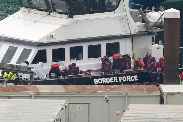 A group of people thought to be migrants are brought in to Dover, Kent, from a Border Force vessel (Gareth Fuller/PA)