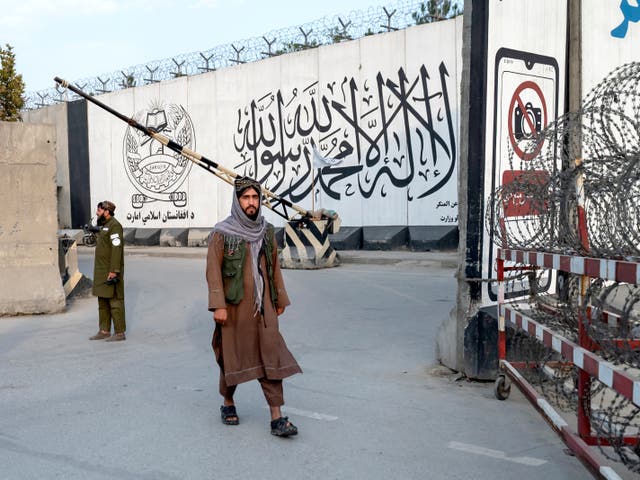 <p>File. Taliban security personnel stand guard at an entrance gate of the Ministry for the Propagation of Virtue and the Prevention of Vice in Kabul on 16 October 2024</p>