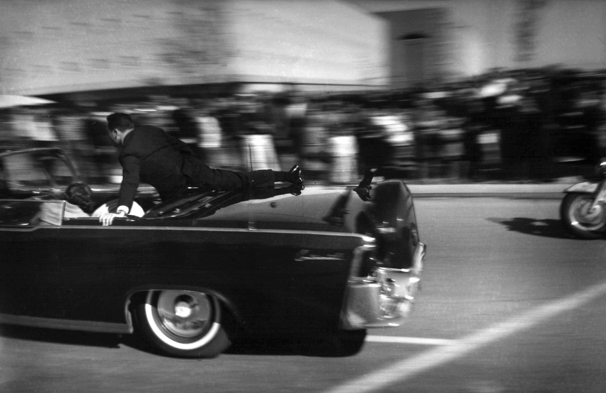 The limousine carrying mortally wounded President John F. Kennedy races toward the hospital seconds after he was shot on November 22, 1963. Trump has ordered the released of records related to the killing and two other high-profile assassinations