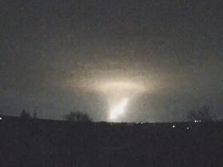 A missile is seen falling from the clouds over Dnipro in central Ukraine on Thursday.