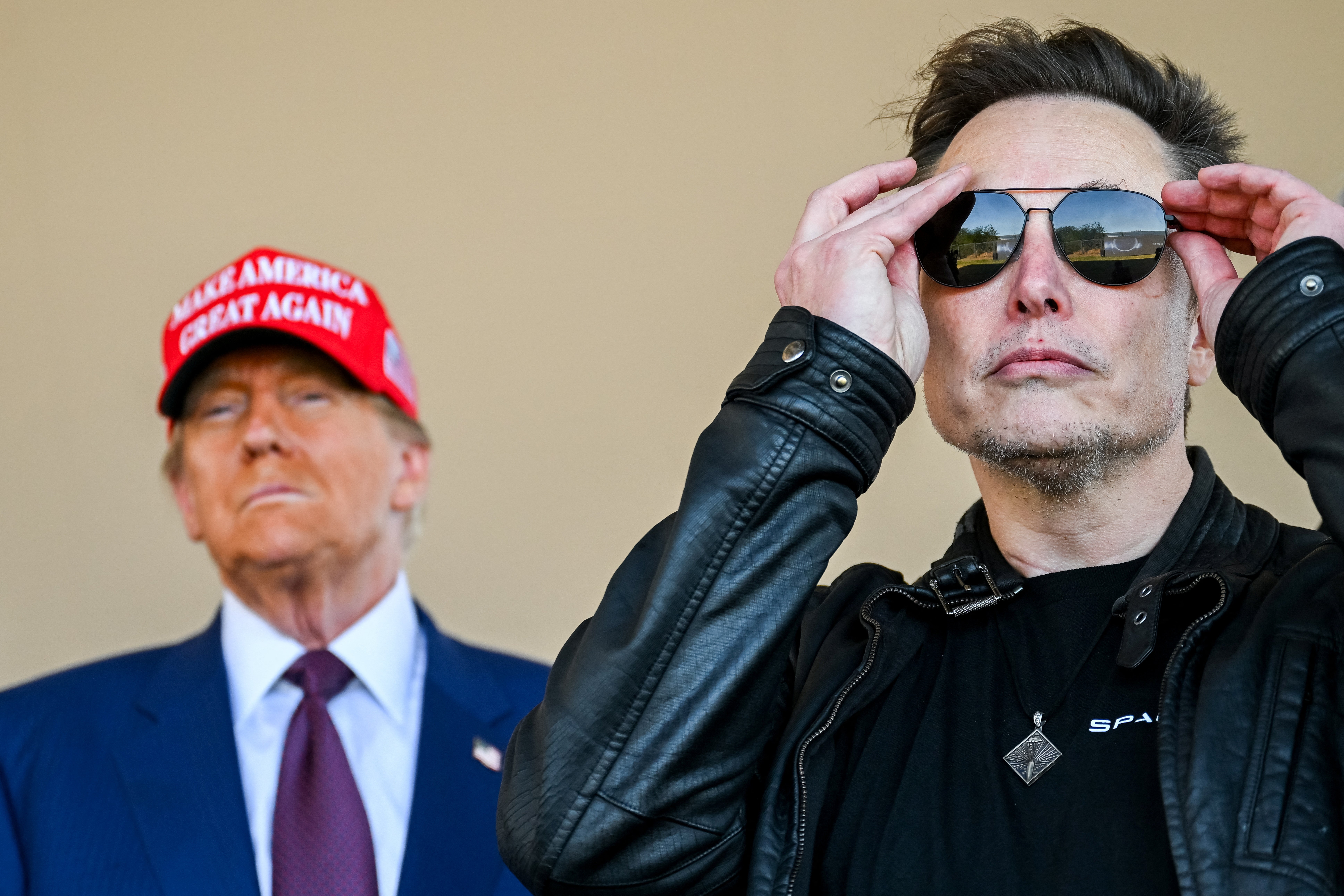 One of Trump’s senior advisers threatened to unleash Musk (pictured with Trump at his SpaceX launch) on Republican senators, according to a report