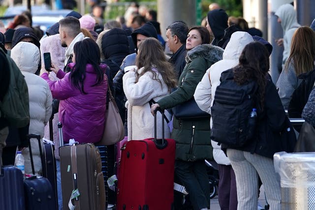 Passengers at Gatwick airport, where flights have been cancelled and delayed after a ‘suspected prohibited item’ was found in luggage (Gareth Fuller/PA)