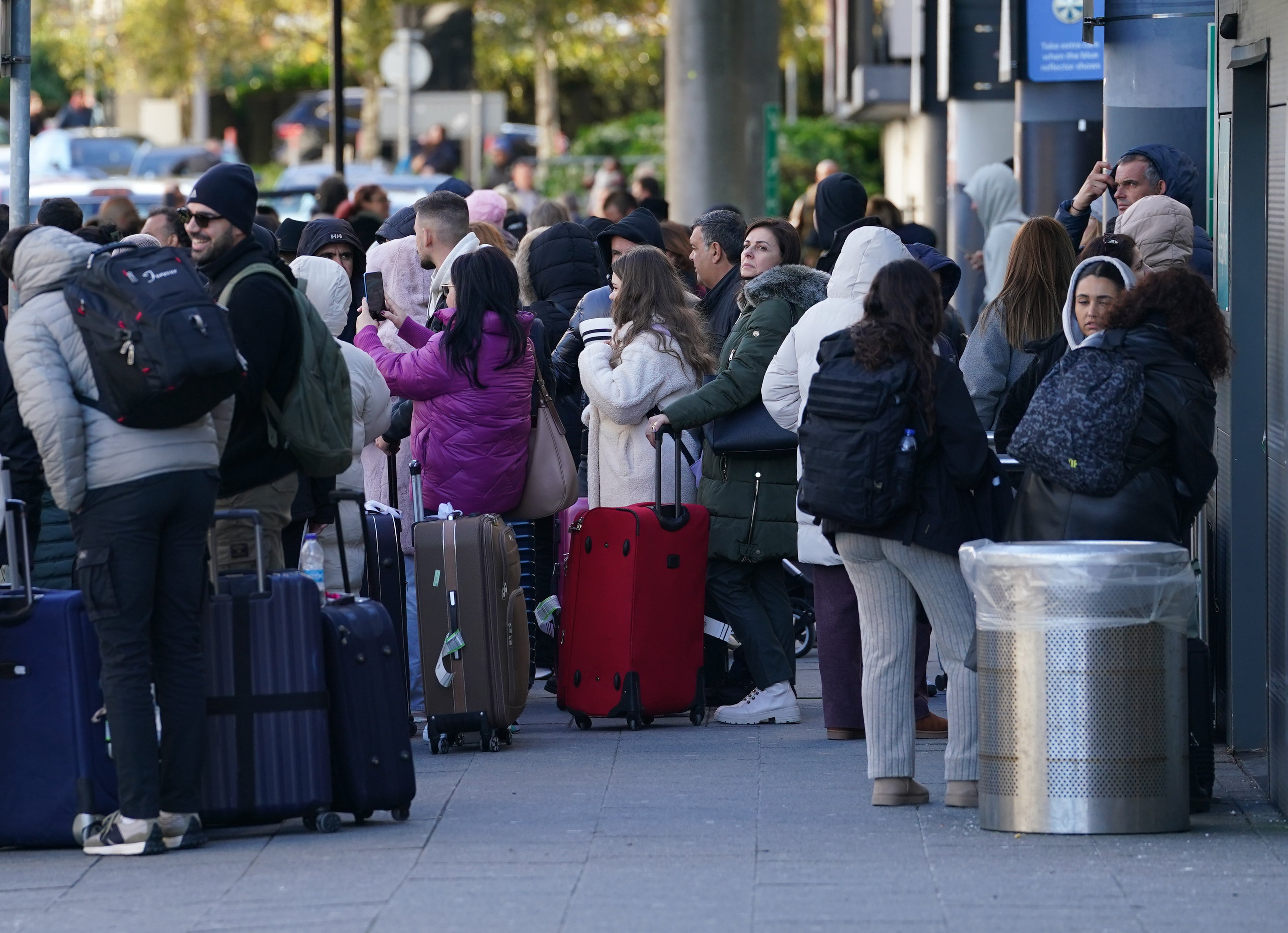 Passengers at Gatwick airport near Crawley, West Sussex (Gareth Fuller/PA)