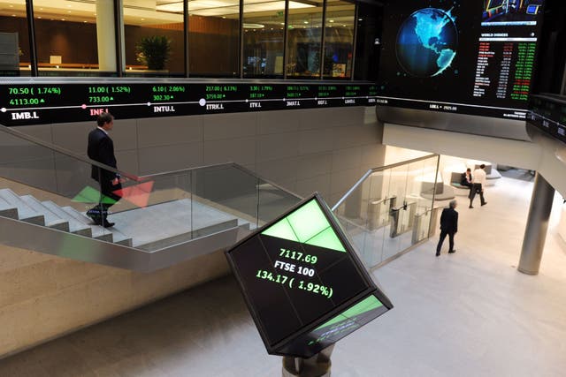 UK stocks rose on Friday amid growing hopes of interest rate cuts (Nicholas T Ansell/PA)