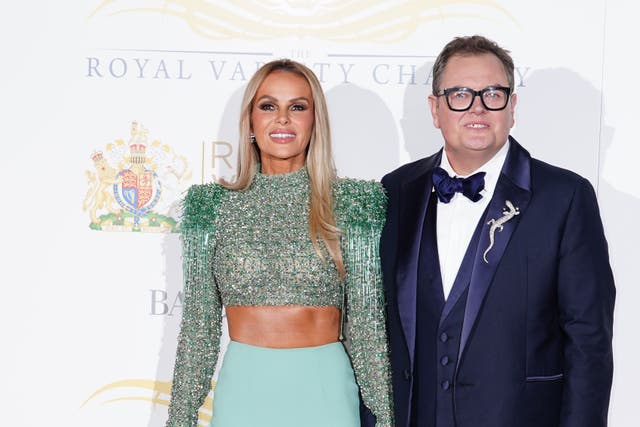 Amanda Holden and Alan Carr arrive for the Royal Variety Performance at the Royal Albert Hall in London (Ian West/PA)