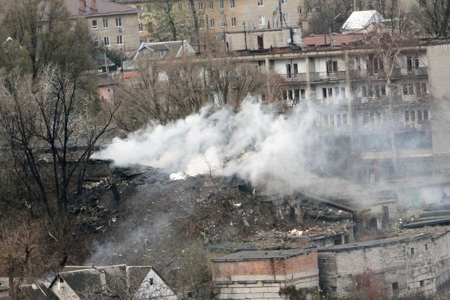 <p>Smoke rises over Dnipro after Russia launched a ballistic missile as part of a strike on the Ukrainian city </p>