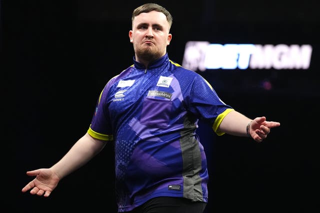 Luke Littler was in imperious form as he destroyed Rob Cross at the Players Championship Finals (Zac Goodwin/PA)