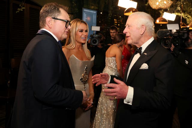 The King meets Alan Carr after the Royal Variety Performance at the Royal Albert Hall, London. (Hollie Adams/PA)