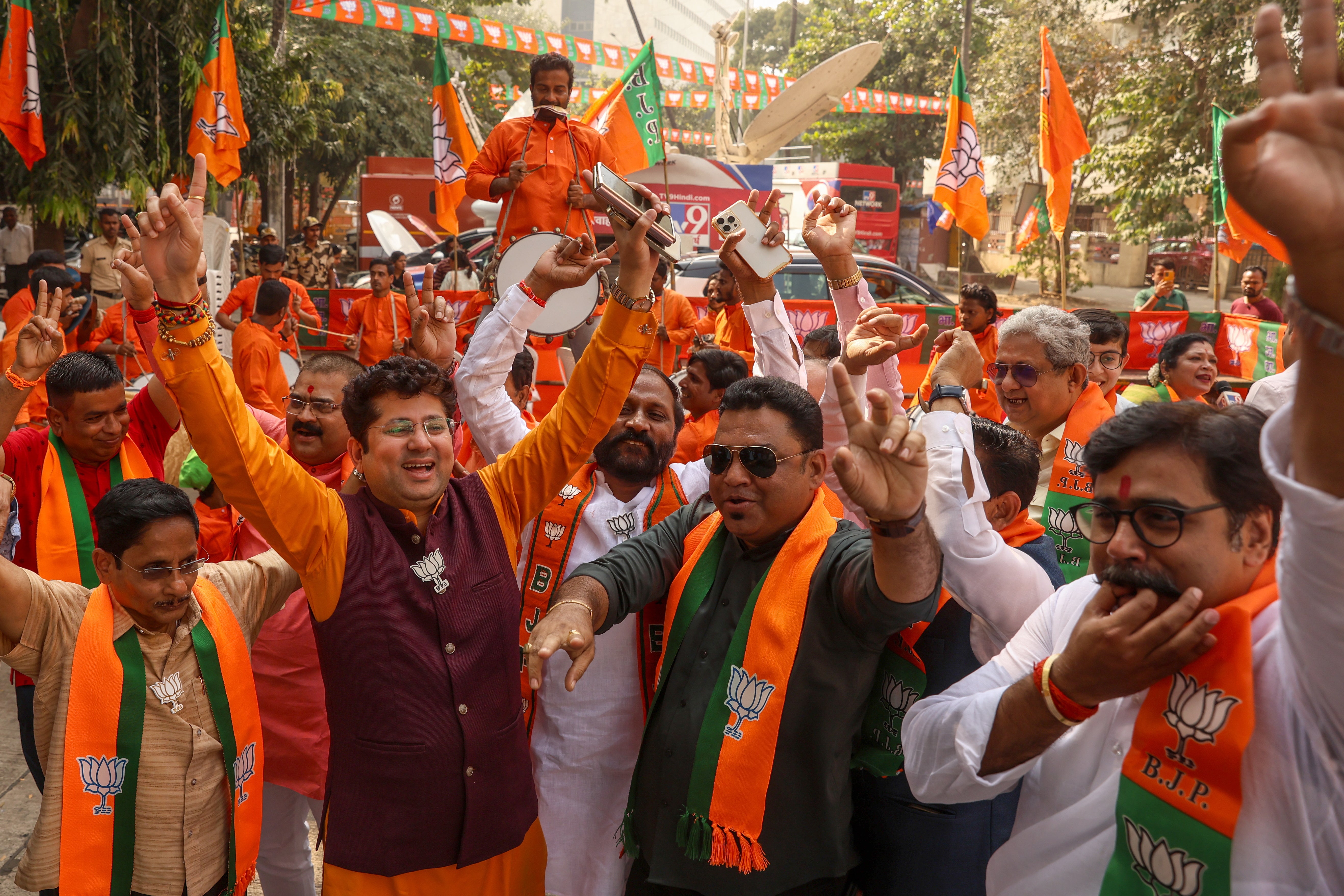 BJP supporters celebrate the election result in Maharashtra in Mumbai