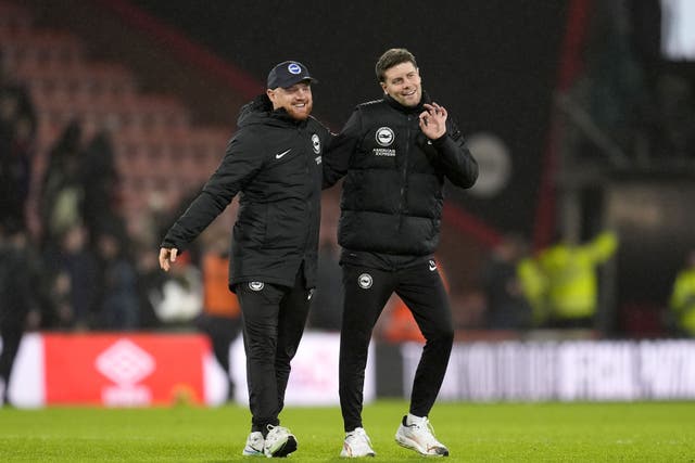 Fabian Hurzeler, right, and Jonas Scheuermann celebrate after Brighton’s 2-1 win at Bournemouth (Andrew Matthews/PA)