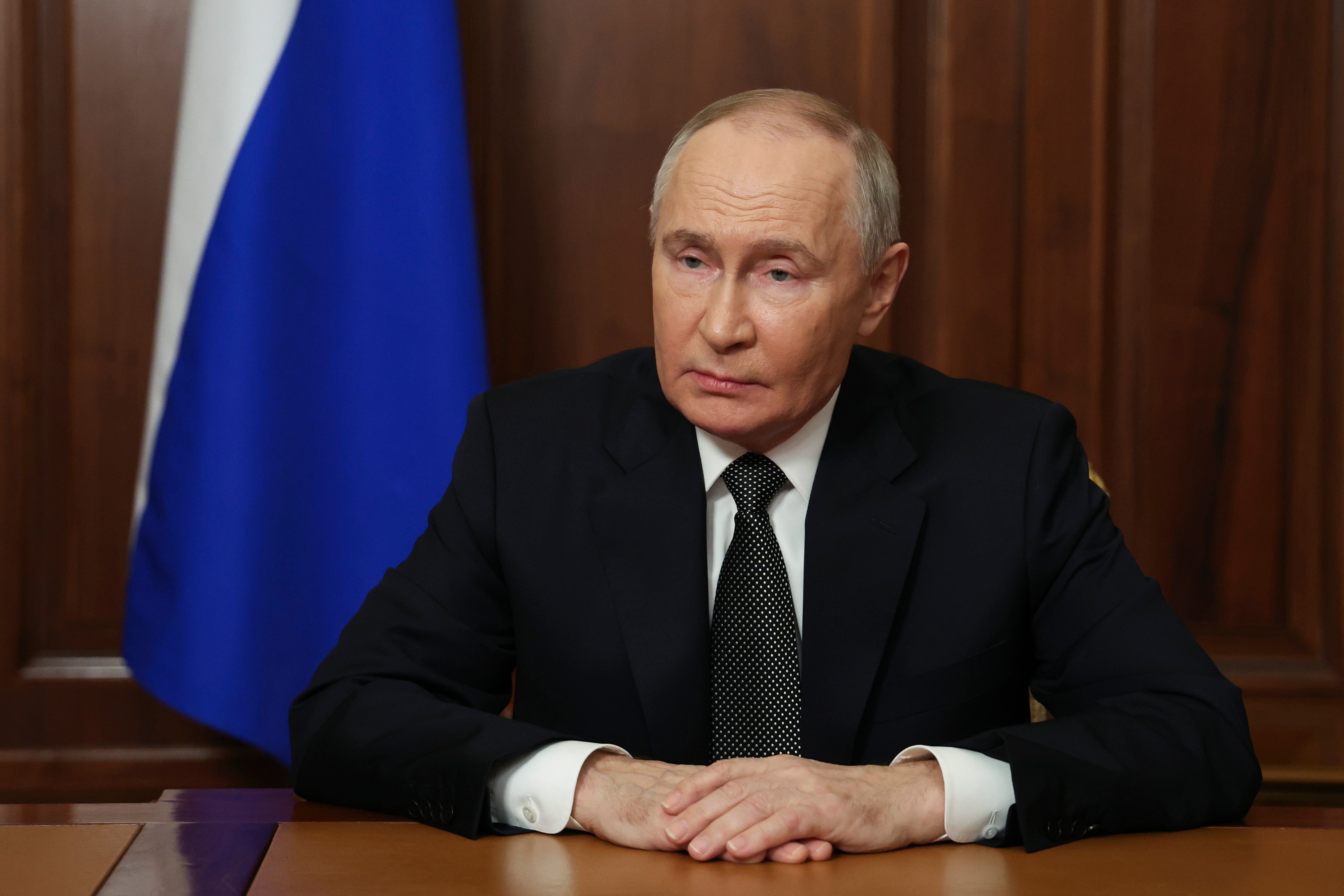 Russian President Vladimir Putin records a televised address in Moscow