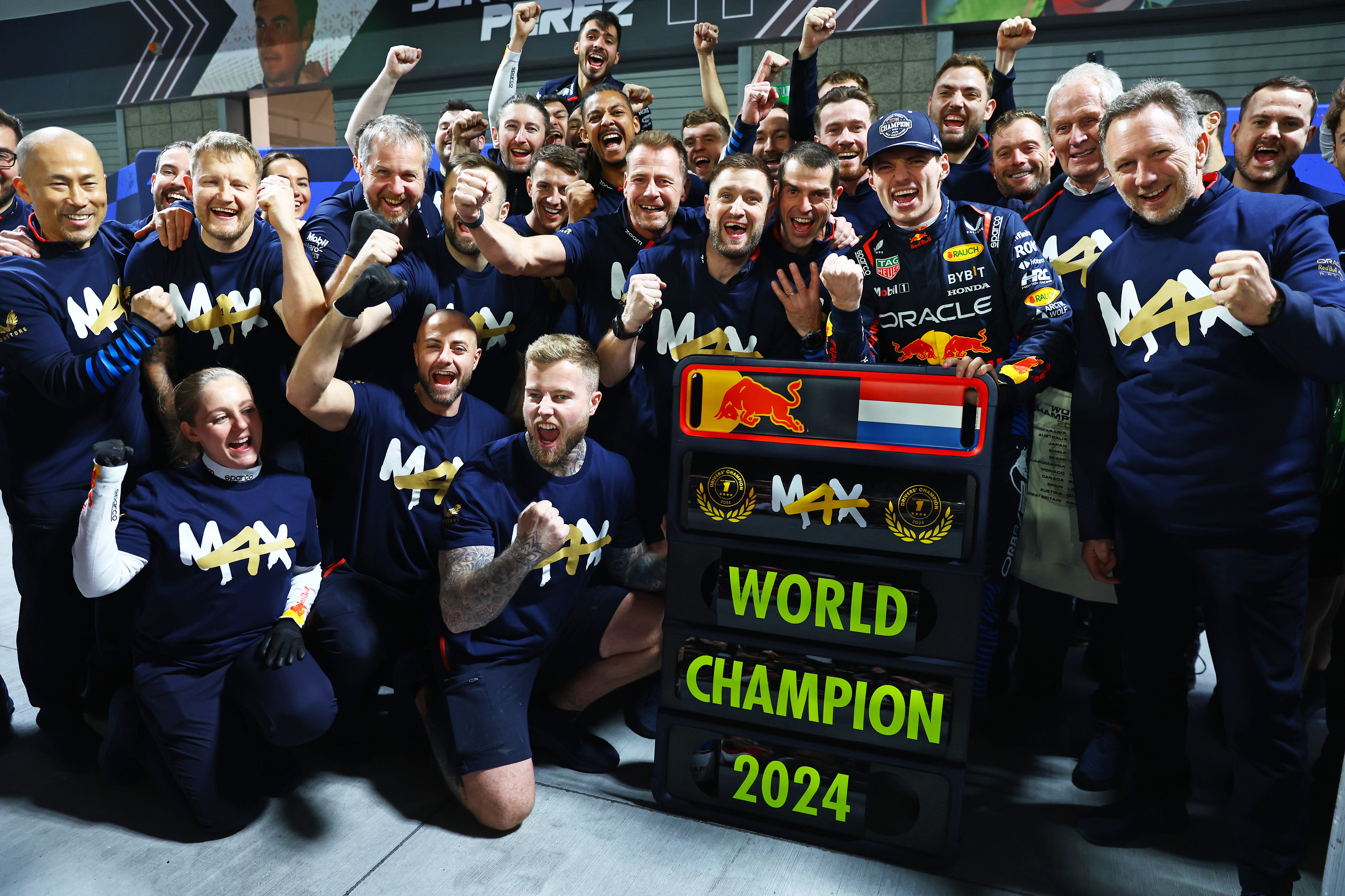 Verstappen celebrates his 2024 championship with his Red Bull team