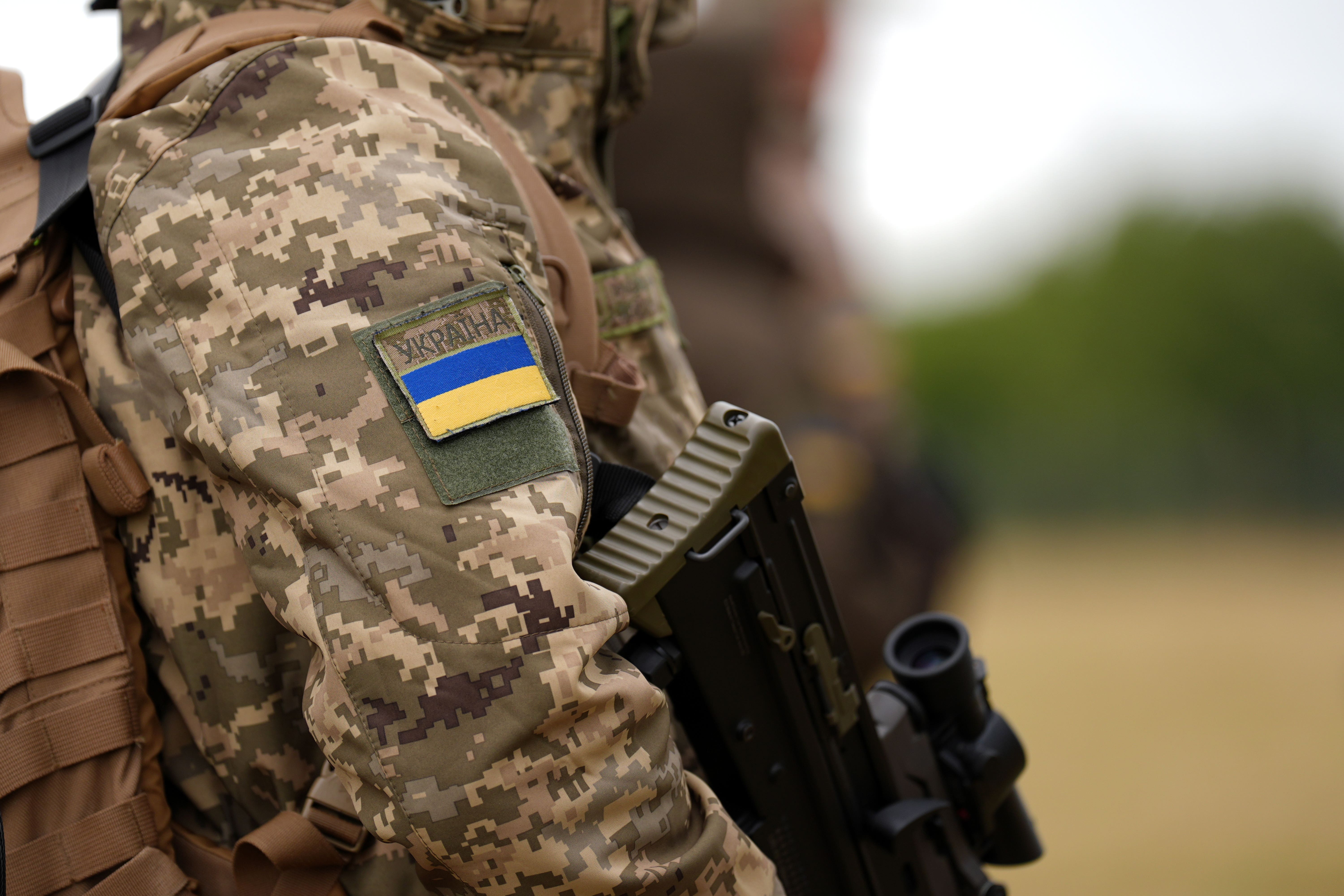 Ukrainian army personnel with members of the UK Armed Forces during a training session in the East Midlands in September (Joe Giddens/PA)