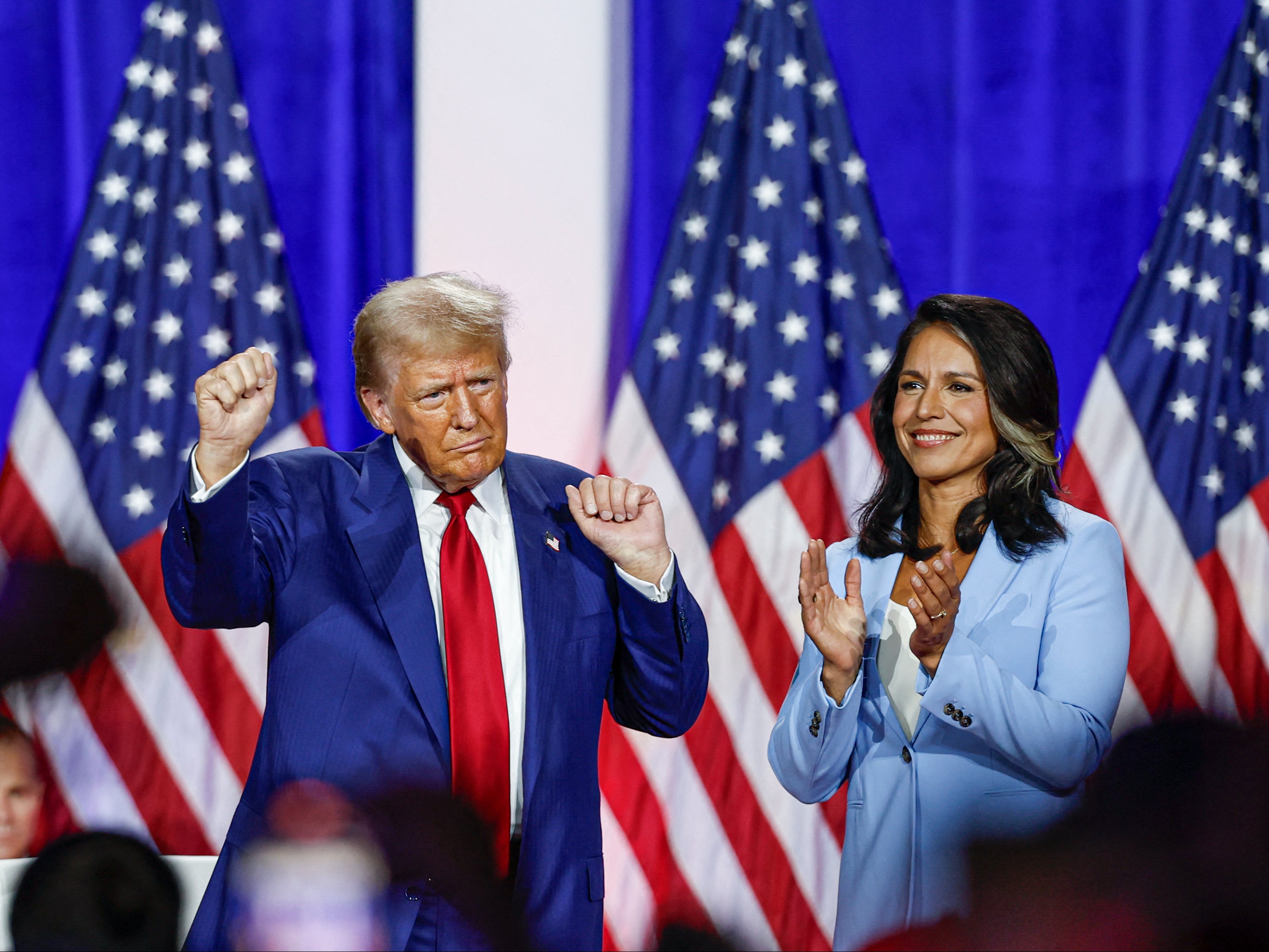 Donald Trump and Tulsi Gabbard on the campaign trail in La Crosse, Wisconsin, last August