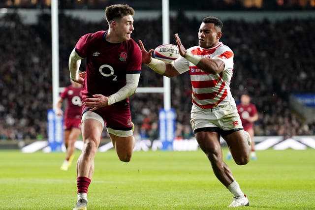 Tommy Freeman passes behind his back to set up a try for George Furbank (David Davies/PA)